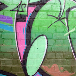 Full frame shot of graffiti on wall