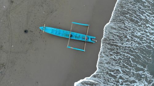 High angle view of swimming pool by sea during winter