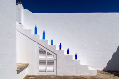 White building against blue sky on sunny day