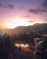 Scenic view of mountains against sky during sunset