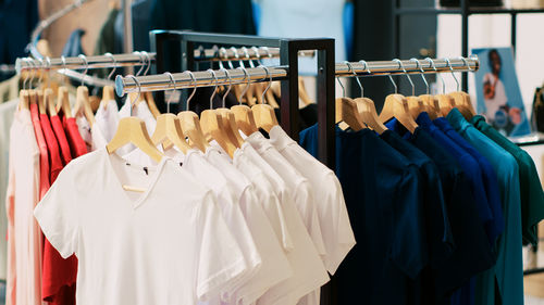 Close-up of clothes hanging on rack