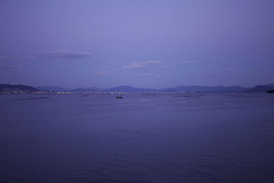 Scenic view of sea against sky at sunset