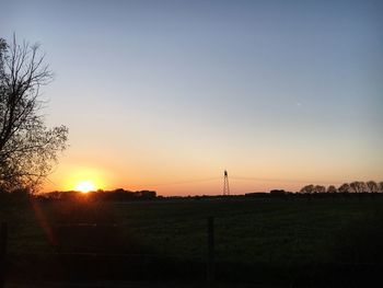 Scenic view of landscape at sunset