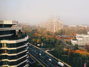 Aerial view of city against sky