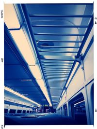 Low angle view of illuminated ceiling