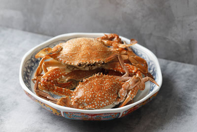 Close up of streamed blue crabs sand crab, popular as flower crab