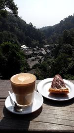 Close-up of coffee served on table