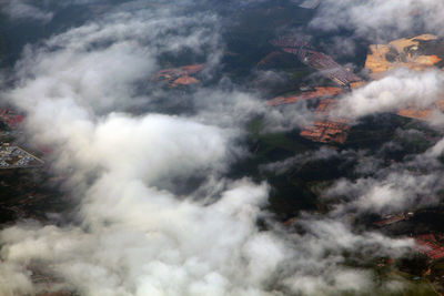 Aerial view of clouds over mountain