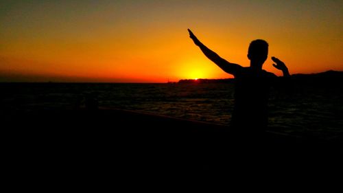 Scenic view of sea at sunset