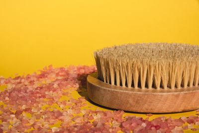 Dry massage brush with natural bristle, ecological cosmetics, home care. natural sea salt bamboo