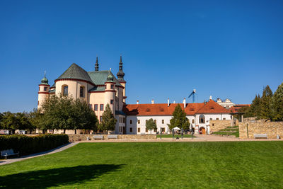 View of historic building against clear blue sky