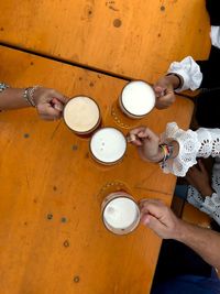 High angle view of people on table