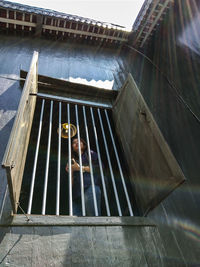 Low angle view of woman in building