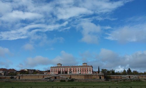 View of building against cloudy sky