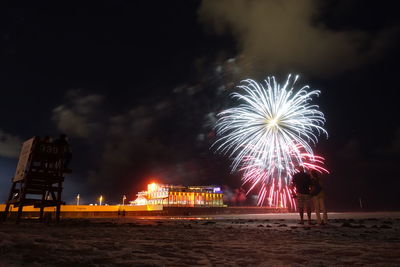 Firework display at night