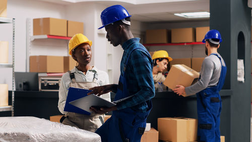 Close-up of architects working in office