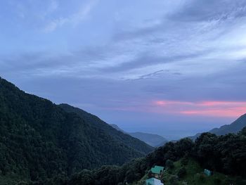 Scenic view of mountains against sky during sunset
