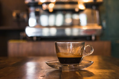 Close-up of coffee cup on table