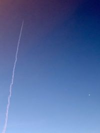 Low angle view of vapor trail in sky