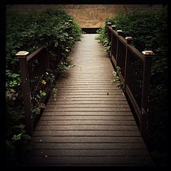 View of wooden footbridge