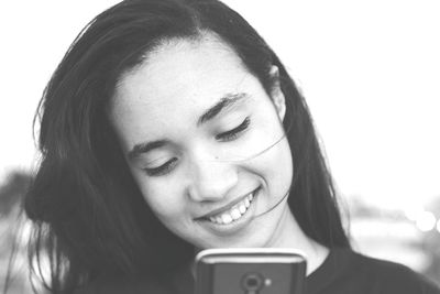 Close-up portrait of young woman