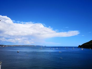 Scenic view of sea against blue sky