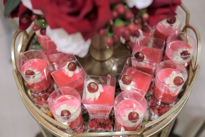 High angle view of candies in glass on table