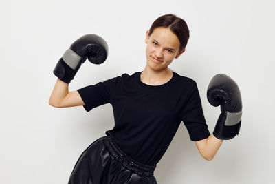 Portrait of teenager girl wearing gloves