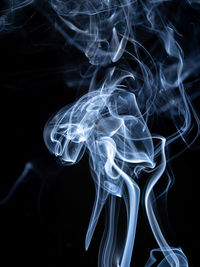 Close-up of smoke against black background