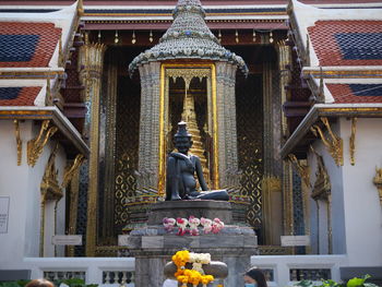 Statue of buddha outside building