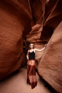 Woman standing on rock