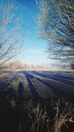 Scenic view of landscape against sky during winter