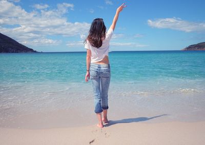 Rear view of woman on beach