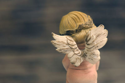 Close-up of figurine outdoors