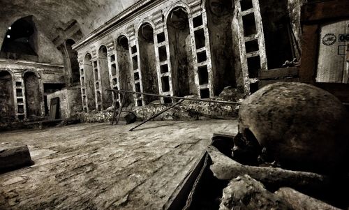 Old abandoned house by building