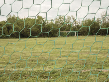 Close-up of soccer field against sky