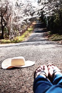 Low section of person on road