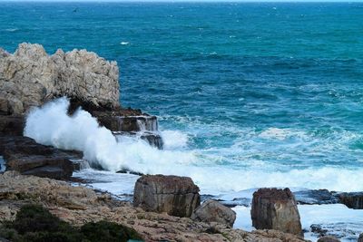 Scenic view of sea against blue sky