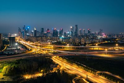 High angle view of illuminated city at night