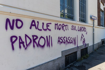 Text on wall of building