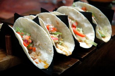 Close-up of tacos served on table