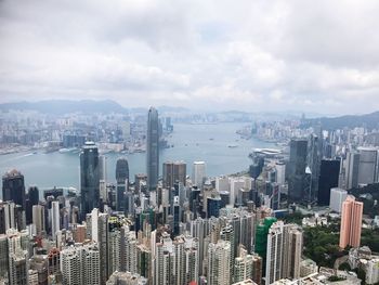 Aerial view of modern buildings in city against sky