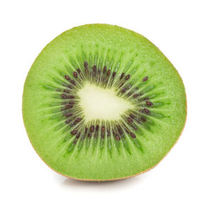 Close-up of fruit against white background