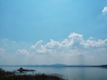 Scenic view of sea against blue sky