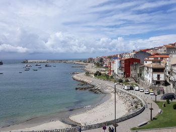 Panoramic view of beach against sky in city