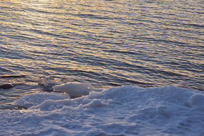 High angle view of river flowing in winter