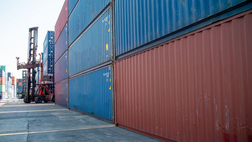 Low angle view stack of containers.