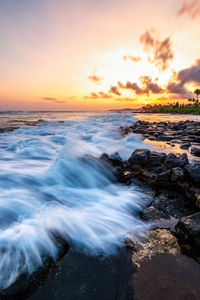 Scenic view of sea against sky during sunset