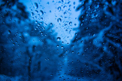 Full frame shot of wet glass window