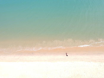 Scenic view of beach against clear sky